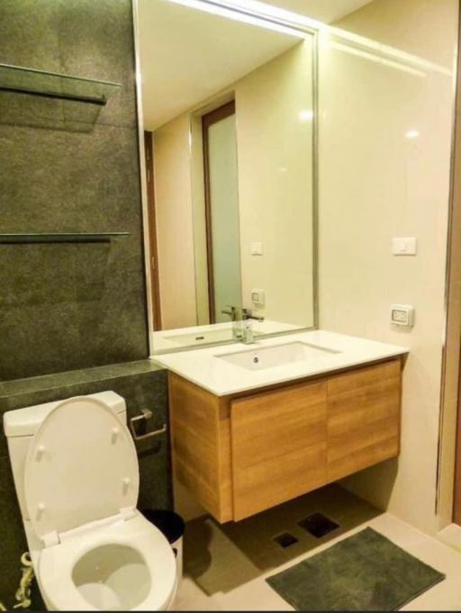 Modern bathroom interior with toilet and sink