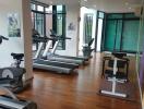 Indoor home gym with various exercise equipment