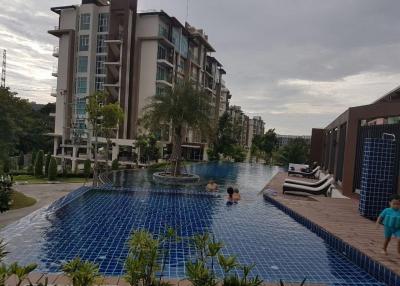 Luxurious Condominium Complex with Swimming Pool and Relaxing Outdoor Area