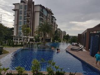 Luxurious Condominium Complex with Swimming Pool and Relaxing Outdoor Area