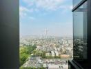 Panoramic city view from a high-rise building window