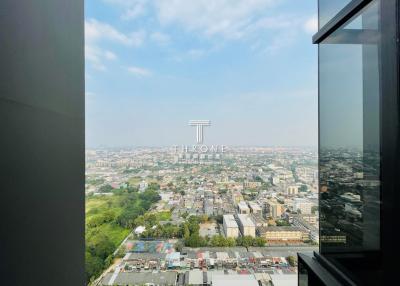 Panoramic city view from a high-rise building window