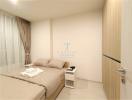 Modern bedroom with neutral color scheme and ample lighting