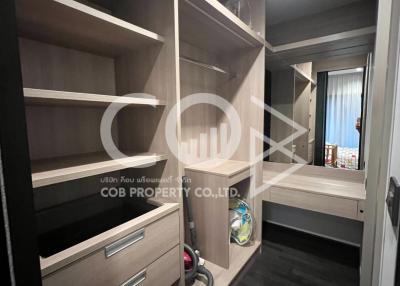 Spacious bedroom with built-in wardrobe and vanity