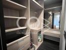 Spacious bedroom with built-in wardrobe and vanity