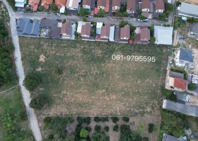 Aerial view of vacant land plot for real estate listing
