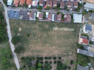 Aerial view of vacant land plot for real estate listing