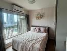 Cozy bedroom with a comfortable bed and natural light