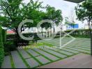 Spacious balcony with greenery and artificial grass