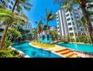 Residential complex with pool and palm trees