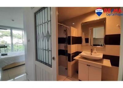 Bright bathroom with modern fixtures and a view