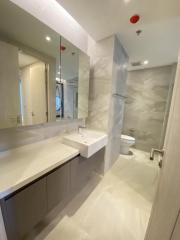Modern bathroom with neutral tones and sleek finishings