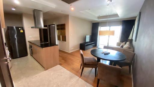 Modern living space with integrated kitchen and dining area