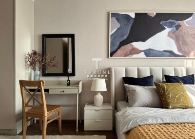 Modern bedroom with stylish decor and art