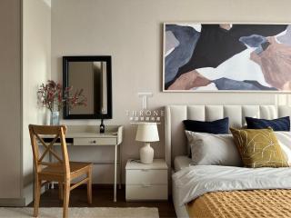 Modern bedroom with stylish decor and art