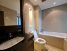 Modern bathroom interior with a wide mirror and tile finish