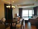 Spacious living room with dining area and balcony access