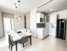 Modern kitchen with dining table set in a bright apartment