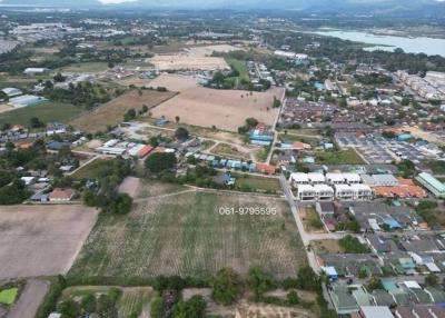 Aerial view of a residential neighborhood with potential building land