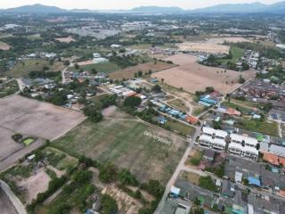 Aerial view of a residential area with potential real estate development land