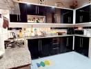 Modern kitchen with black cabinetry and granite countertops