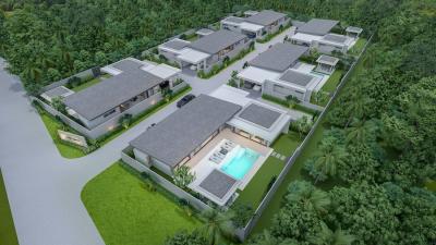 Modern residential housing complex surrounded by greenery with ample outdoor space and a swimming pool