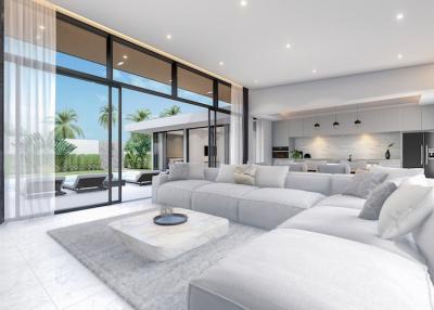 Modern spacious living room with open kitchen design, large sofa, and floor-to-ceiling windows