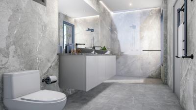 Modern bathroom with grey stone tiles and walk-in shower
