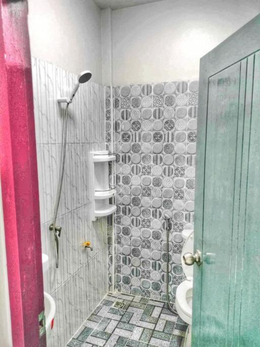 Modern bathroom interior with patterned tiles