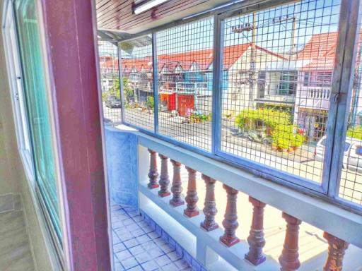 Bright balcony with a view of the neighborhood