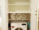 Compact laundry area with LG washing machine and built-in shelves