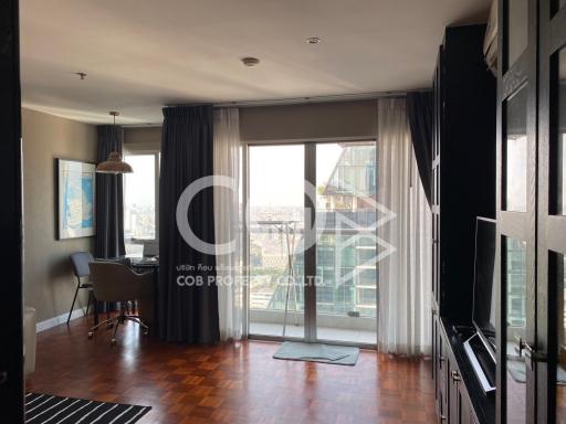 Modern living room with city view through large windows