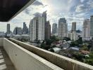 Spacious balcony with city skyline view and ample daylight