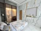 Modern bedroom with marble walls and elegant decor