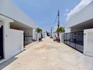 Modern residential street view with newly constructed houses