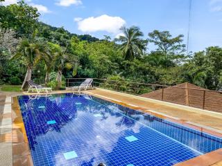 6 bedrooms within 2 houses - 700 sqm. With Pool For Sale In Kata Phuket