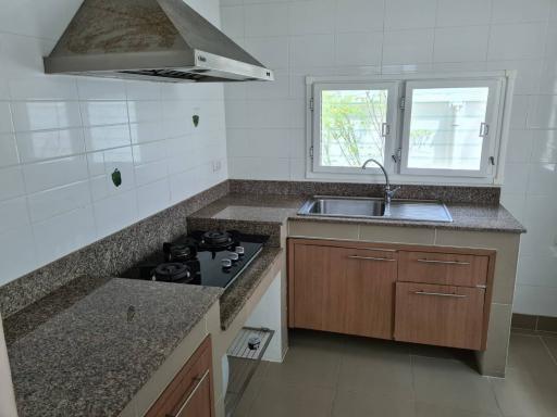 Modern kitchen with granite countertops and stainless steel appliances