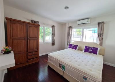 Spacious Bedroom with Air Conditioning and Natural Light