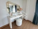 Modern bedroom interior with elegant dressing table and decorative mirror