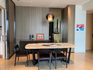 Contemporary dining room with oval table and modern decor