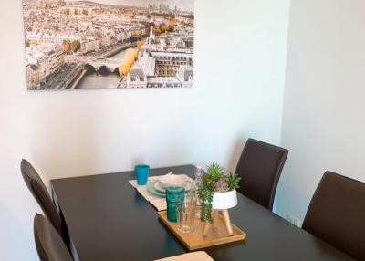 Modern dining area with table set for two