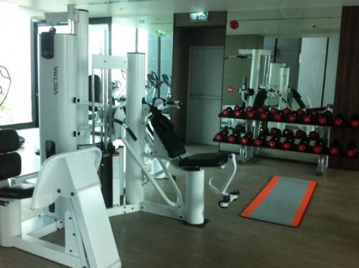 Modern gym facility with equipment and weights