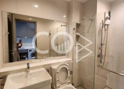 Modern Bathroom Interior with Glass Shower and White Fixtures