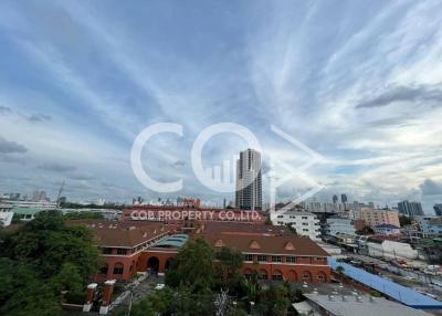 Panoramic cityscape view from property showcasing surrounding buildings and skyline