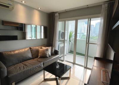 Modern living room with natural light and city view