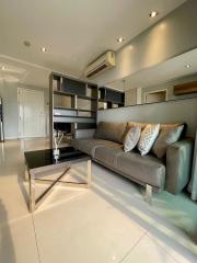 Elegant modern living room with quality finishes and ample light