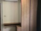 compact bedroom with air conditioning and built-in wardrobe