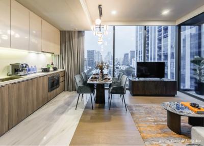 Modern living room with dining area and city view