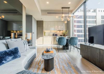 Modern living room with open space to dining and kitchen area