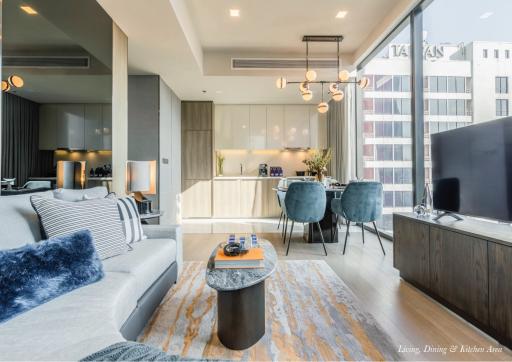 Modern living room with open space to dining and kitchen area